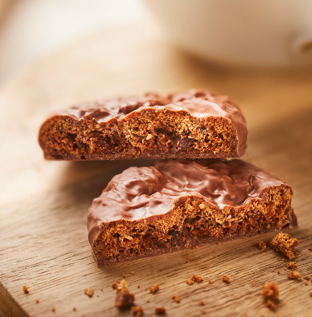 A Ringtons triple chococlate cookie cut in half