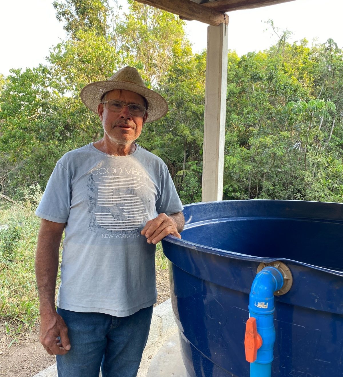 AfarmerwithhisirrigationsysteminBraziltocombatirregularrainfall.